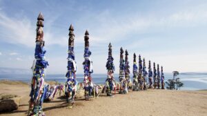 181603059ed39523340bff6728564877-300x168 Vivid colored ribbons Hadak tied on posts of wish, wooden ritual pillars.